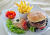 Beefburger with salad and fries