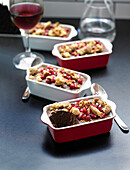 Baked chocolate pudding with pomegranate and amaretti