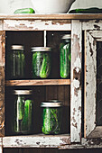 Pickles in a jar, old kitchen shelf