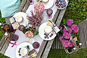 Table laid in garden with autumn theme