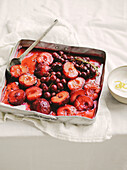 Oven-roasted plums and grapes