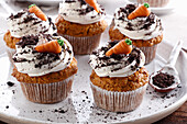 Carrot muffins sprinkled with crushed oreo
