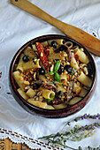 Mezzi Rigatoni with olives, anchovies and breadcrumbs