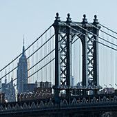 Williamsburg Bridge And Empire State Building; New York City, New York, United States Of America