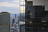 Office Building With Glass Walls Reflecting Other Buildings; Osaka, Japan