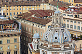 Dome Of Church Roof With Cross And Various Other Buildings; Rome, Italy