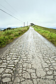 Long View Of A Damaged Road Above A Mountain; Costa Rica