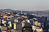 Golden Hour Light View Over Istanbul Rooftops Towards Bosphurus Bridge Between Europe And Asia; Istanbul, Turkey