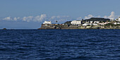 Ischia Island With Walls Along The Waterfront And White Buildings Up On The Promontory; Ischia, Italy