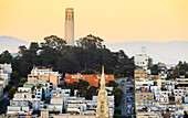 Coit Tower On Telegraph Hill At Sunset; San Francisco, California, United States Of America