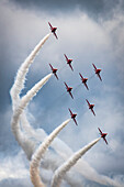 Red Arrows air display, nine planes flying in diamond nine formation, their trademark formation; South Shields, Tyne and Wear, England