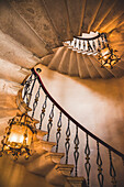 Spiral staircase and chandeliers, Duino Castle; Trieste, Friuli Venezia Giulia, Italy