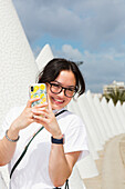 Young female tourist at City of Arts and Sciences; Valencia, Spain