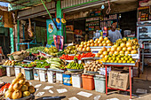 Sudanese man selling produce at the market; Dongola, Northern State, Sudan