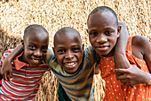 Ugandan children, Tombs of Buganda Kings at Kasubi; Kampala, Central Region, Uganda