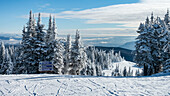 Sign for three ski runs at Sun Peaks Resort in the Rocky Mountains;  Sun Peaks, British Columbia, Canada