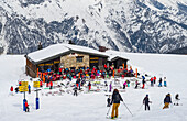 Skiers at an alpine resort, Italian side of Mont Blanc; Courmayeur, Aosta Valley, Italy