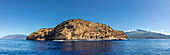 Five image files were combined to create this panorama of the backwall of Molokini Crater, the crescent-shaped islet off the island of Maui, Hawaii. The West Maui Mountains are to the left and Haleakala to the right; Maui, Hawaii, United States of America