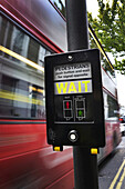 View of Speeding Bus at Crosswalk, London, England, UK