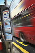 Double Decker Bus Speeding by Schedule, London, England, UK