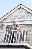 Couple Standing on Balcony