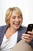 Mature Woman Using Cell Phone