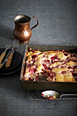 Bushberry Pudding Cake in baking pan, studio shot