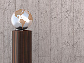 Illustration eines Metallglobus auf einem Holzständer, der Nord- und Südamerika zeigt, Studioaufnahme auf grauem, hölzernem Hintergrund