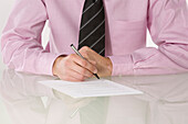 Close-up of Businessman Writing