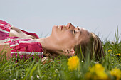 Woman Lying Down in Meadow