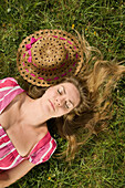 Woman Lying Down in Meadow