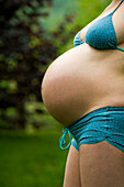 Profile of the Belly of a Nine Months Pregnant Woman