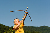 Boy Shooting Arrow, Salzburg, Salzburger Land, Austria