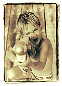 Portrait of Boy with Water Gun