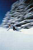 Blurred View of Man Snowboarding, Jungfrau Region, Switzerland