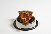 Slice of Pizza in Dog Bowl
