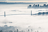Lion's Gate Bridge and Vancouver Covered in Fog, British Columbia, Canada