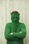 Man with Turtleneck Covering Face