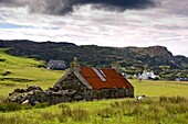 Isle Of Colonsay, Scotland; Stone Farmhouse And Surrounding Field