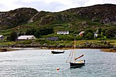 Isle Of Colonsay, Scotland; Sailboats And Coastal Dwellings