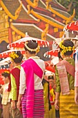 Thai Women In Traditional Dresses In New Year Festival, Rear View; Chiang Mai, Thailand