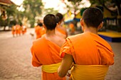 Buddhist Monks Collecting Food And Special Sonkran Blessing, Wat Srisoda, Buddhist Temple And Monastery; Chiang Mai, Thailand