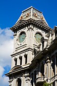 Low Angle View Of Clock Tower On The Gridley Building; Syracuse, New York, Usa
