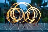 Three Fire-Twirlers Performing; Bali, Indonesia