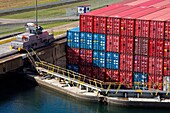 Gatun Locks, Panama Canal, Panama, Central America; Container Ship In Lock