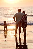 Puerto Vallarta, Mexico; Family On Beach At Sunset