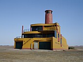 Ein gelbes Gebäude in Peru