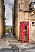 Telephone Booth Outside A Building; Malta,Mediteranean