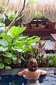 Woman Bathing At Resort, Nusa Dua, Bali, Indonesia