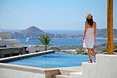 Young Woman On Poolside Terrace, Cabo San Lucas, Mexico